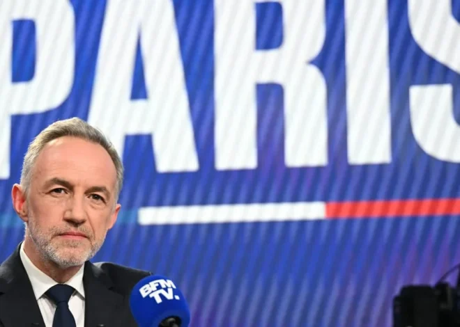 Far right’s main rival for French presidency on track to survive electoral scare, poll shows