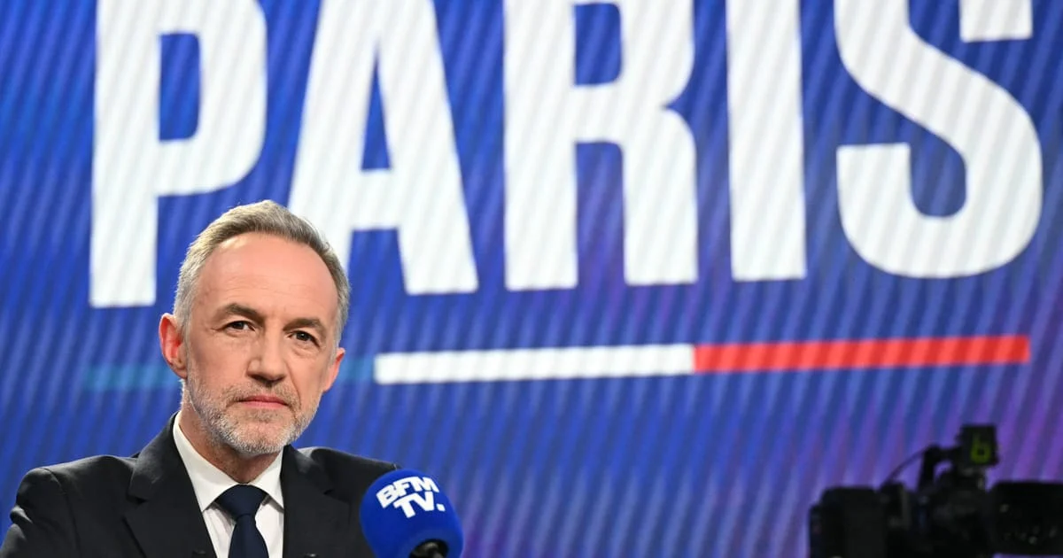Far right’s main rival for French presidency on track to survive electoral scare, poll shows