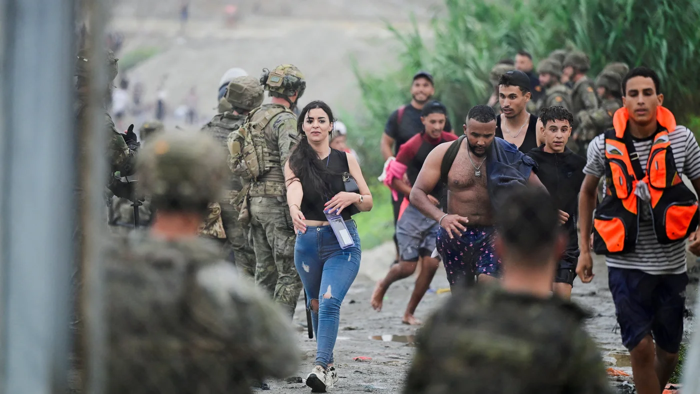 Spain Grapples with Unprecedented Mass Influx as Tens of Thousands Cross from Morocco into Ceuta